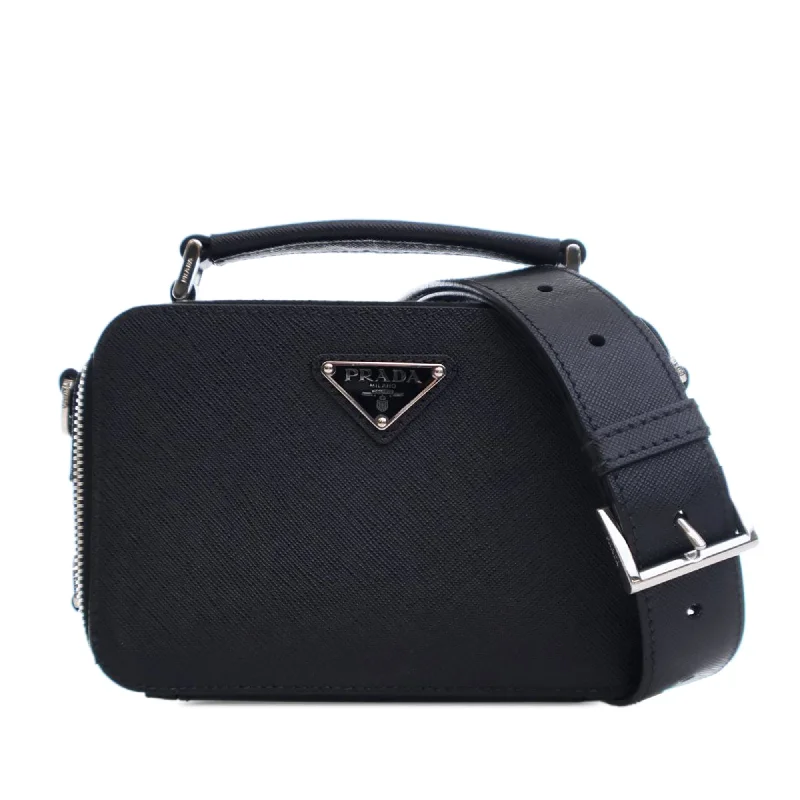 Prada Cahier bags featuring the signature triangular logo plaqueBlack Prada Small Saffiano Brique Satchel