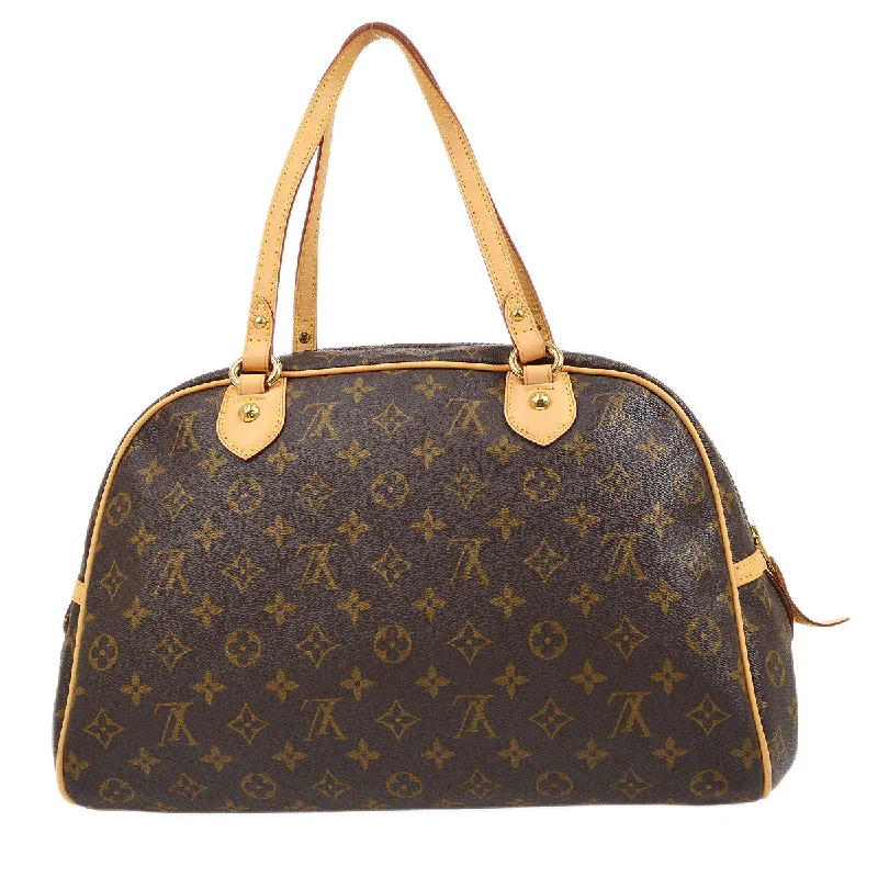 Louis Vuitton bags with a chain - link trim and a leather body for a modern edgeLouis Vuitton 2008 MONTORGUEIL GM M95566