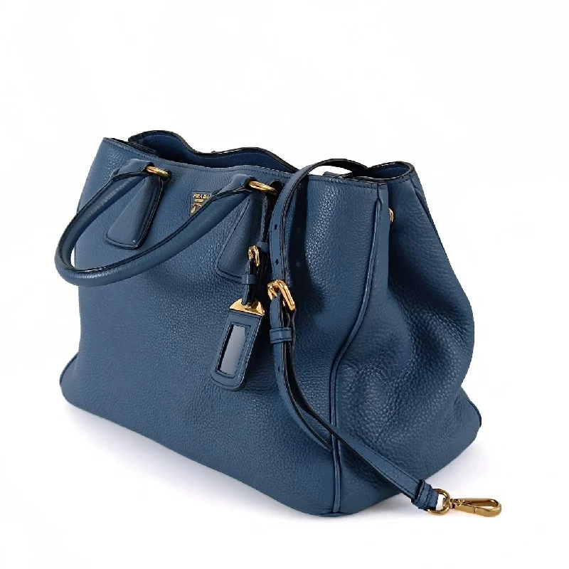 Prada nylon backpacks with a sleek, minimalist appearancePRADA Prada Prada Shopper shoulder bag in cobalt buckskin