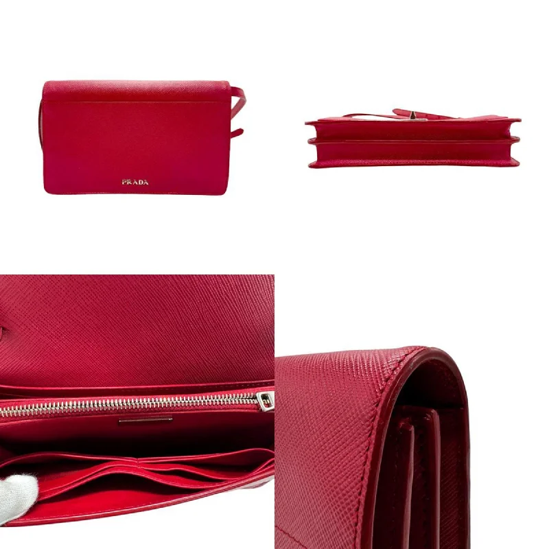 Prada handbags with a metal - framed clasp for durability and stylePRADA Saffiano Wallet