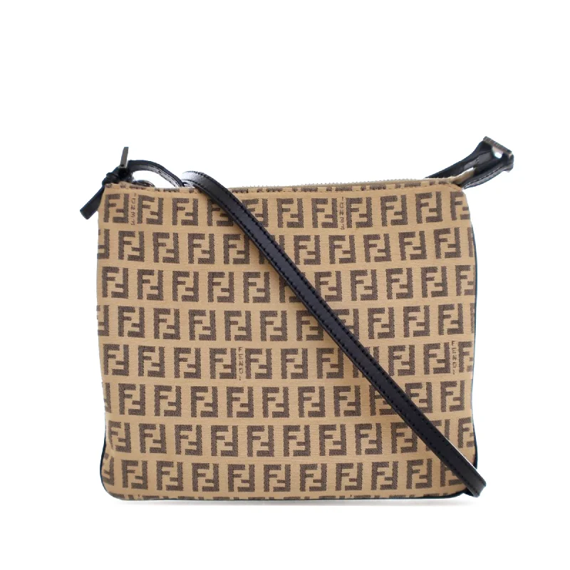 Fendi By The Way bags with a printed map pattern for a travel - inspired lookBrown Fendi Zucchino Canvas Crossbody