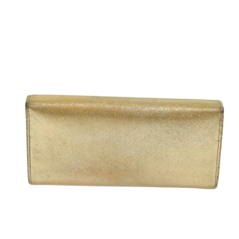 Prada Cahier bags with a detachable shoulder strap for versatile carryingPRADA Safiano leather Long Wallet Gold Tone  72010