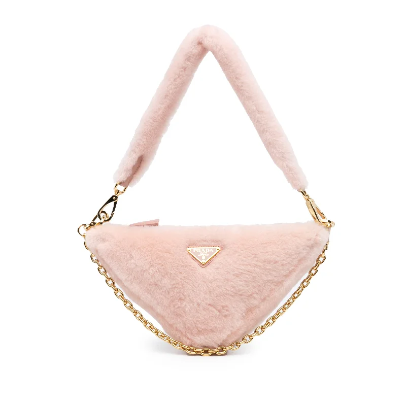 Prada nylon backpacks with a padded laptop compartment for travel and studyPink Prada Mini Shearling Triangle Satchel