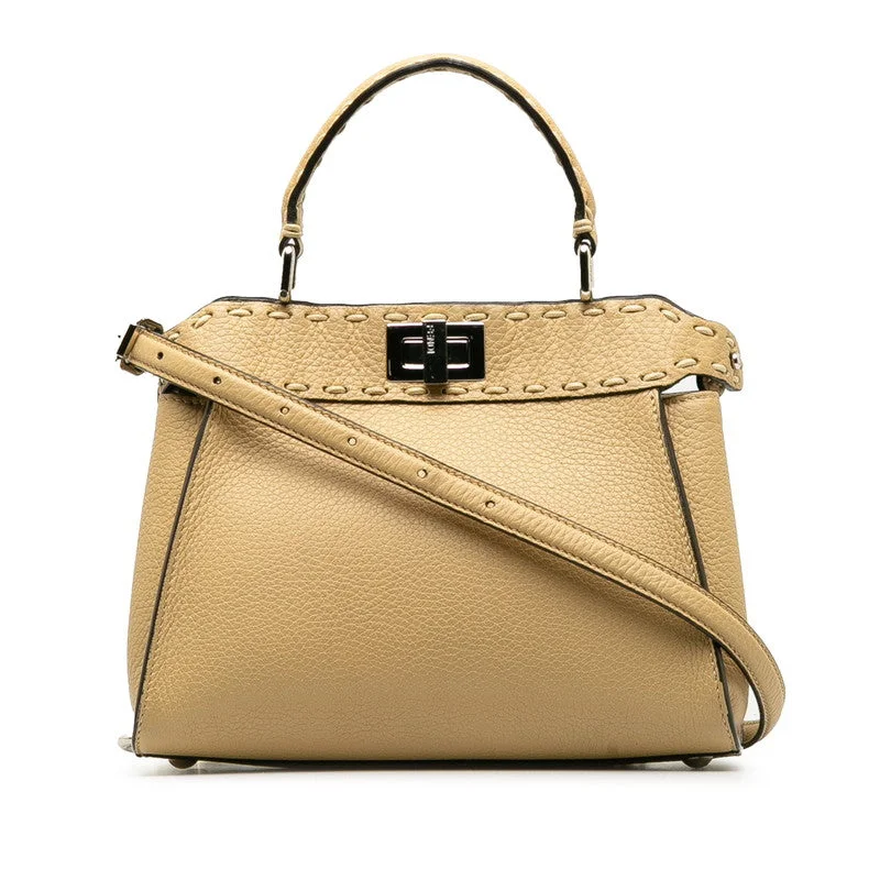 Ladies Fendi Peekaboo bags with a back - pocket organizer for better organizationFENDI Selleria Peekaboo Mini Handbag in Leather Beige 8BN244