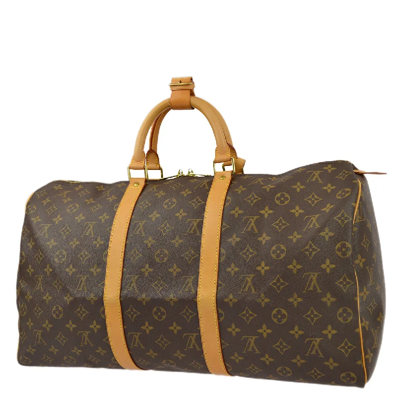 Louis Vuitton Twist bags with a crystal - embellished LV - turnlockLouis Vuitton 2000 Monogram Keepall 50 Duffle Travel Handbag M41426