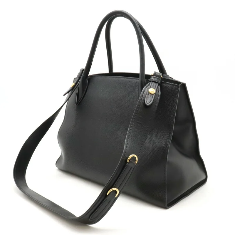 Prada Cleo bags with a curved shape and a chain - link shoulder strapPRADA Saffiano Handbag