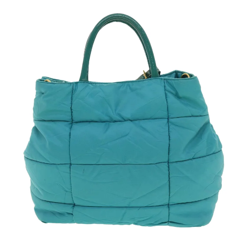 Prada bags with a snap - button closure and a decorative charm for a fashionable lookPRADA Quilted Hand Bag Nylon 2way Turquoise Blue  40351