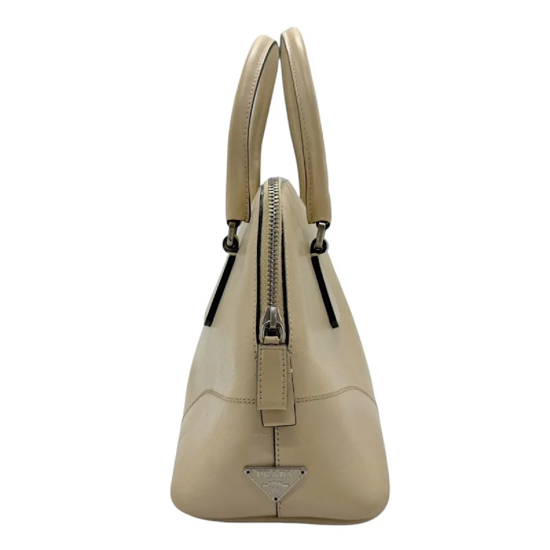 Prada bags with a chain - link trim and a leather body for a modern and stylish edgePRADA Saffiano Handbag