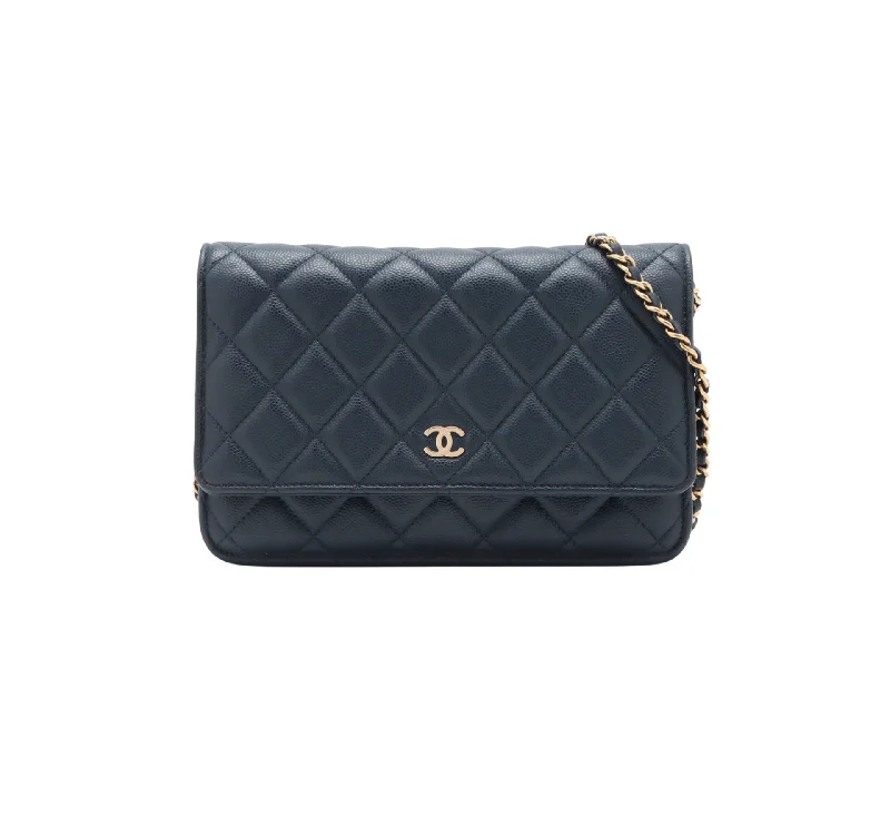 Chanel bags with iconic gold chainsChanel bags with iconic gold chainsChanel Caviar Wallet On Chain WOC Navy (microchipped)