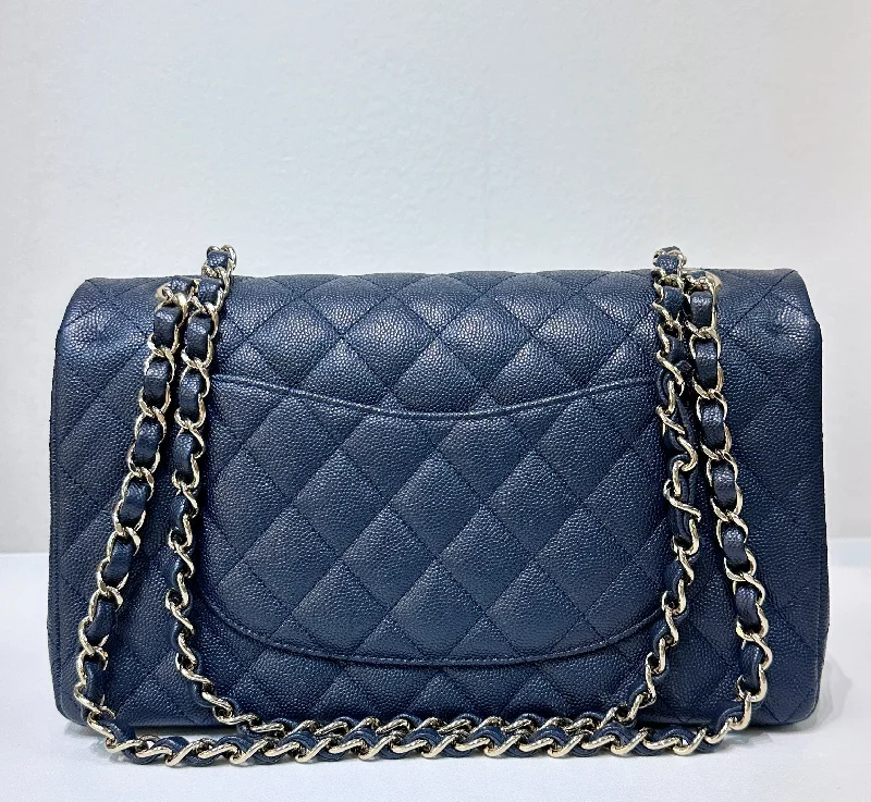 Chanel bags for women who love timeless fashionChanel bags for women who love timeless fashionCHANEL Caviar Quilted Medium Double Flap 18B Navy