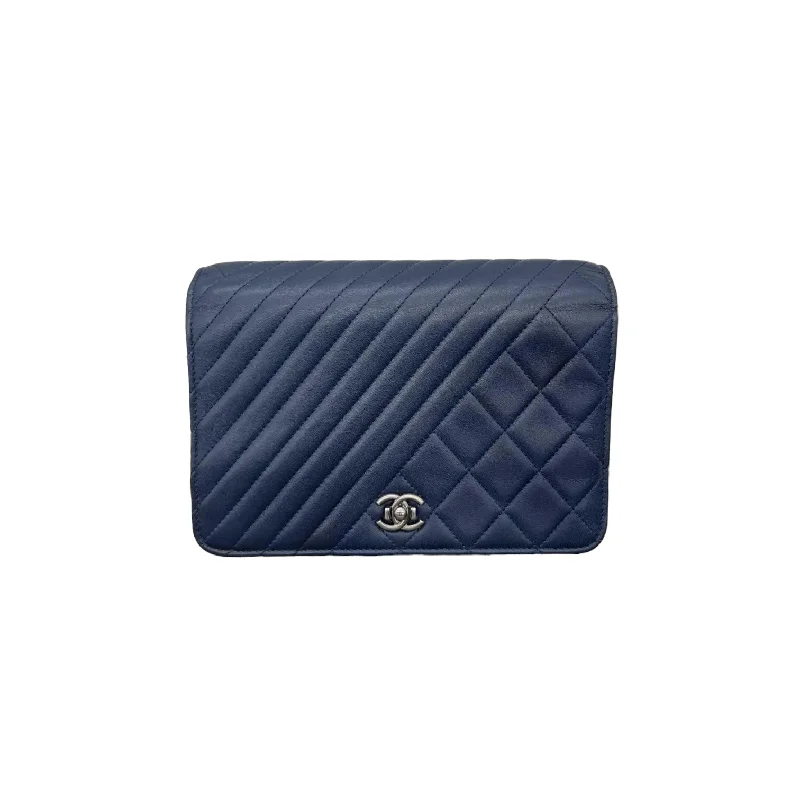 Chanel bags in luxury boutiques worldwideChanel bags in luxury boutiques worldwideQuilted Coco Boy WOC Lambskin Blue RHW