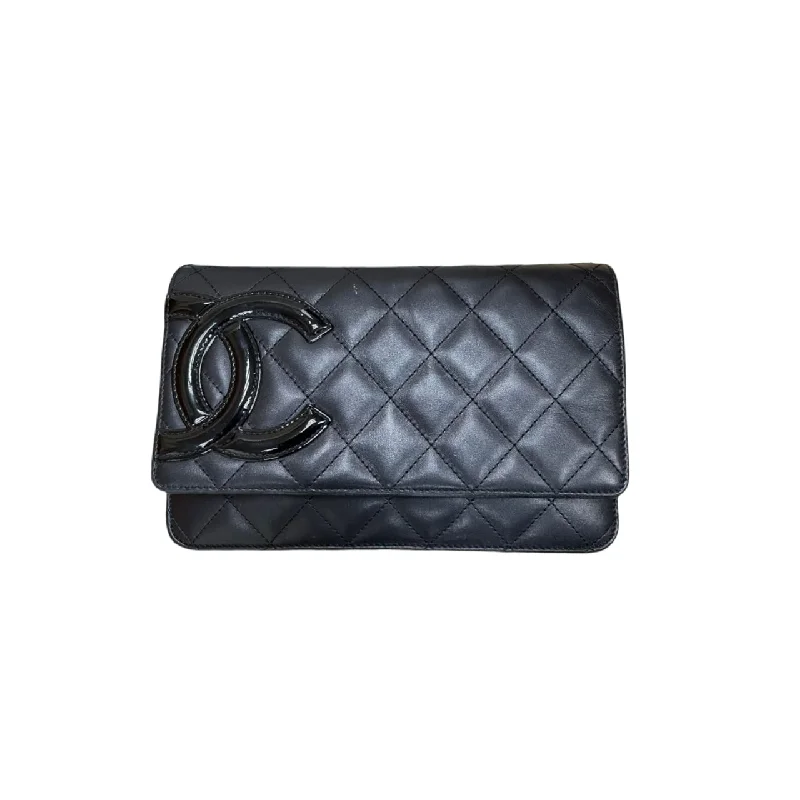 Chanel bags with intricate metal hardwareChanel bags with intricate metal hardwareWOC Wallet on Chain Quilted Lambskin Black SHW