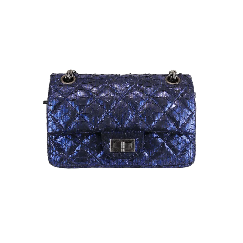 Chanel bags with gold, silver, and pearl accentsChanel bags with gold, silver, and pearl accentsPython Quilted 2.55 Reissue 224 Mini Flap Blue RHW