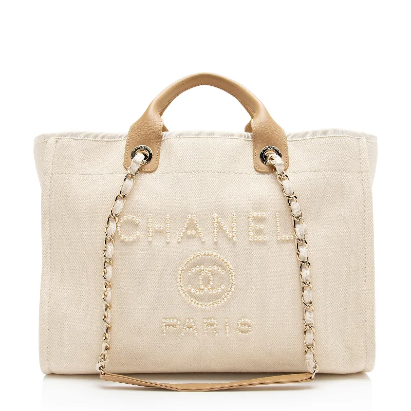 Chanel bags with intricate metal hardwareChanel bags with intricate metal hardwareChanel Canvas Pearl Deauville Medium Tote (SHF-Hmgrlc)