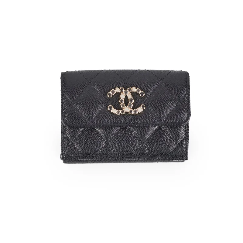 Chanel bags in luxury boutiques worldwideChanel bags in luxury boutiques worldwideChanel Caviar Black Flap Wallet