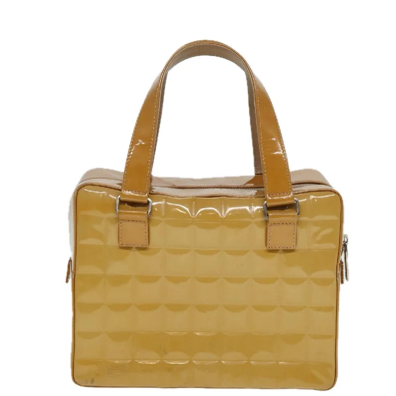 Chanel bags with modern touchesChanel bags with modern touchesCHANEL Choco Bar Hand Bag Patent leather Yellow CC  bs15398